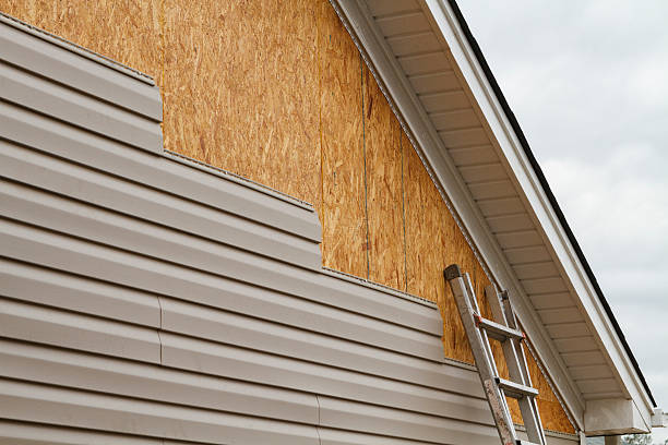Professional Siding Contractor technician working in Oakland, MD